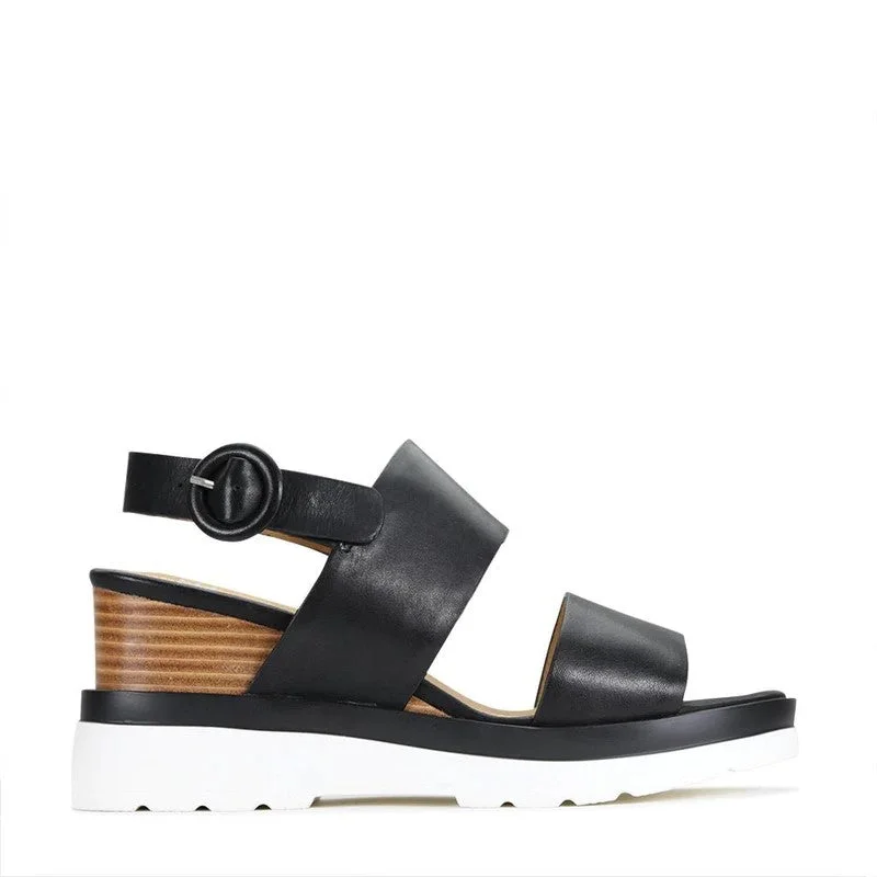 Eos Jades Black Slingback Wedge Sandal